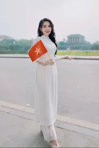 Runner-up Mivi Diem Anh Shines in Vibrant Ao Dai for Vietnam's Reunification Day - image 1