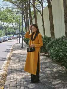 Vietnamese Supermodel Thanh Hằng Stuns in Yellow Ao Dai During Tet Reunion with Anh Thơ - image 14
