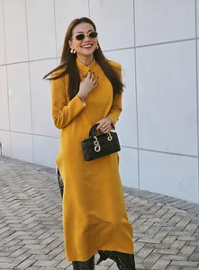 Vietnamese Supermodel Thanh Hằng Stuns in Yellow Ao Dai During Tet Reunion with Anh Thơ - image 9