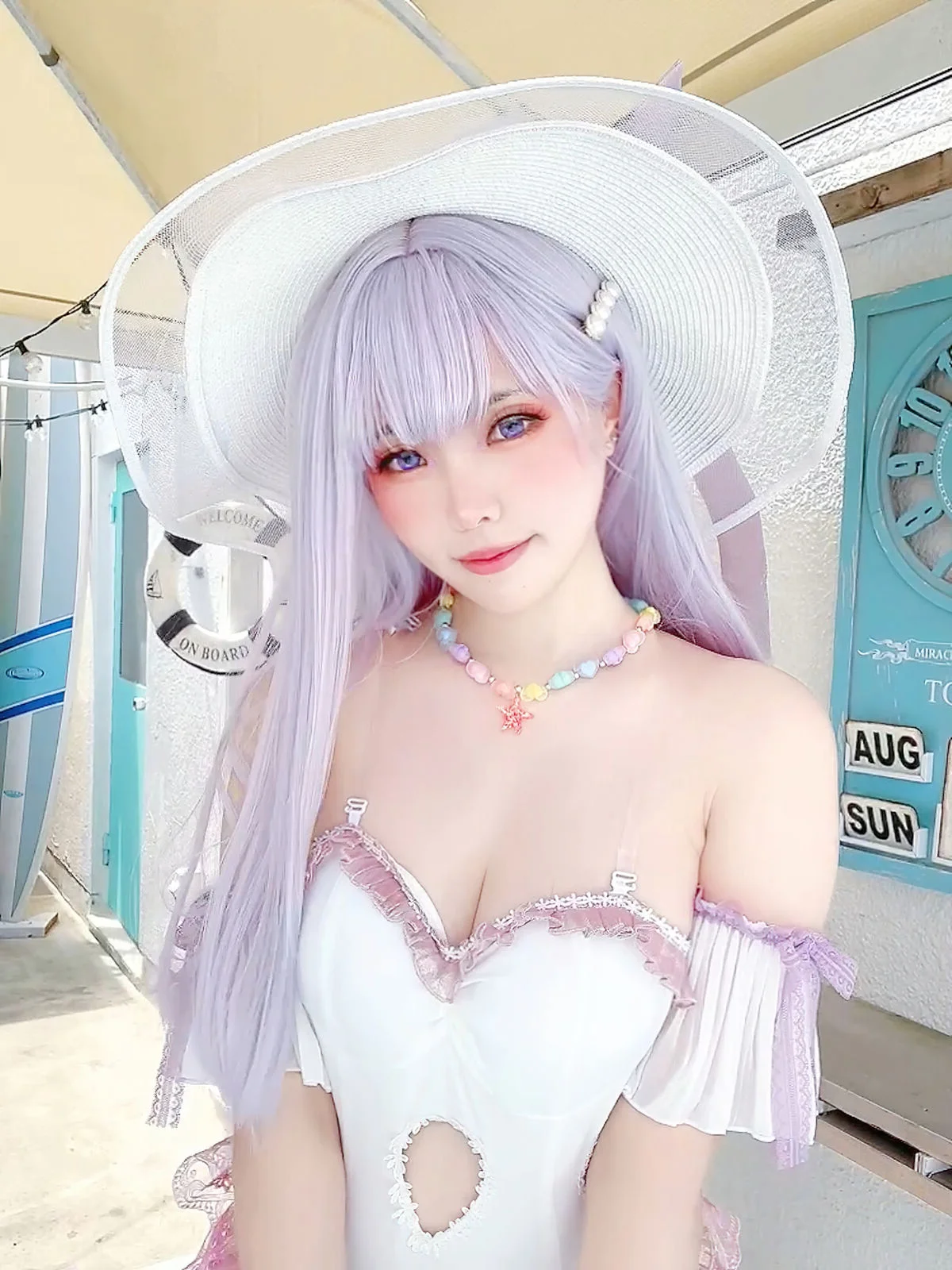 Ethereal Charm: Ely_eee Captivates in the Stunning Plymouth Swimsuit Collection