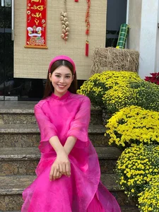Vietnamese Celebrities Shine in Traditional Ao Dai for Lunar New Year 2024 Celebrations - image 26