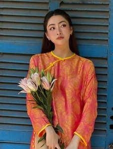 Vietnamese Celebrities Shine in Traditional Ao Dai for Lunar New Year 2024 Celebrations - image 11