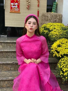 Vietnamese Celebrities Shine in Traditional Ao Dai for Lunar New Year 2024 Celebrations - image 32
