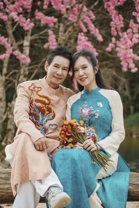 Vietnamese Celebrities Shine in Traditional Ao Dai for Lunar New Year 2024 Celebrations - image 13