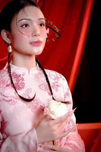 Vietnamese Celebrities Shine in Traditional Ao Dai for Lunar New Year 2024 Celebrations - image 35
