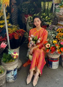 Vietnamese Celebrities Shine in Traditional Ao Dai for Lunar New Year 2024 Celebrations - image 28