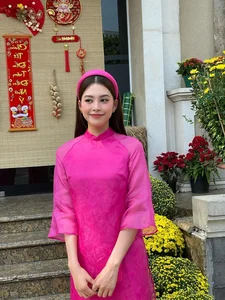 Vietnamese Celebrities Shine in Traditional Ao Dai for Lunar New Year 2024 Celebrations - image 30