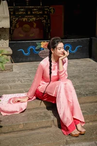 Vietnamese Celebrities Shine in Traditional Ao Dai for Lunar New Year 2024 Celebrations - image 22