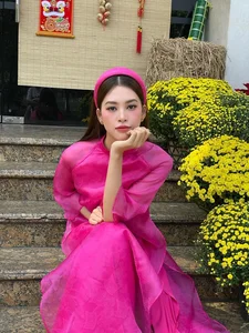 Vietnamese Celebrities Shine in Traditional Ao Dai for Lunar New Year 2024 Celebrations - image 36