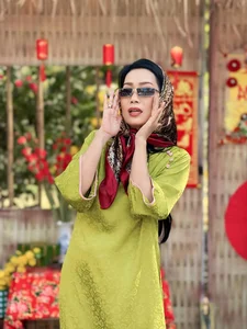 Vietnamese Celebrities Shine in Traditional Ao Dai for Lunar New Year 2024 Celebrations - image 9