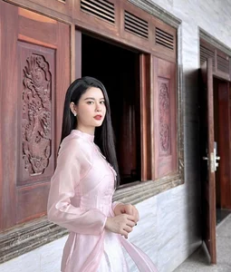 Vietnamese Celebrities Shine in Traditional Ao Dai for Lunar New Year 2024 Celebrations - image 23