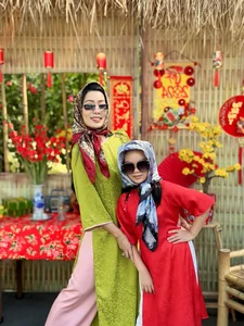 Vietnamese Celebrities Shine in Traditional Ao Dai for Lunar New Year 2024 Celebrations - image 38