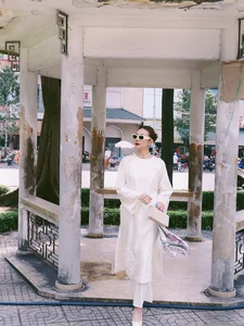 Vietnamese Celebrities Shine in Traditional Ao Dai for Lunar New Year 2024 Celebrations - image 31
