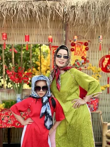 Vietnamese Celebrities Shine in Traditional Ao Dai for Lunar New Year 2024 Celebrations - image 2