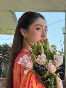 Vietnamese Celebrities Shine in Traditional Ao Dai for Lunar New Year 2024 Celebrations - image 7