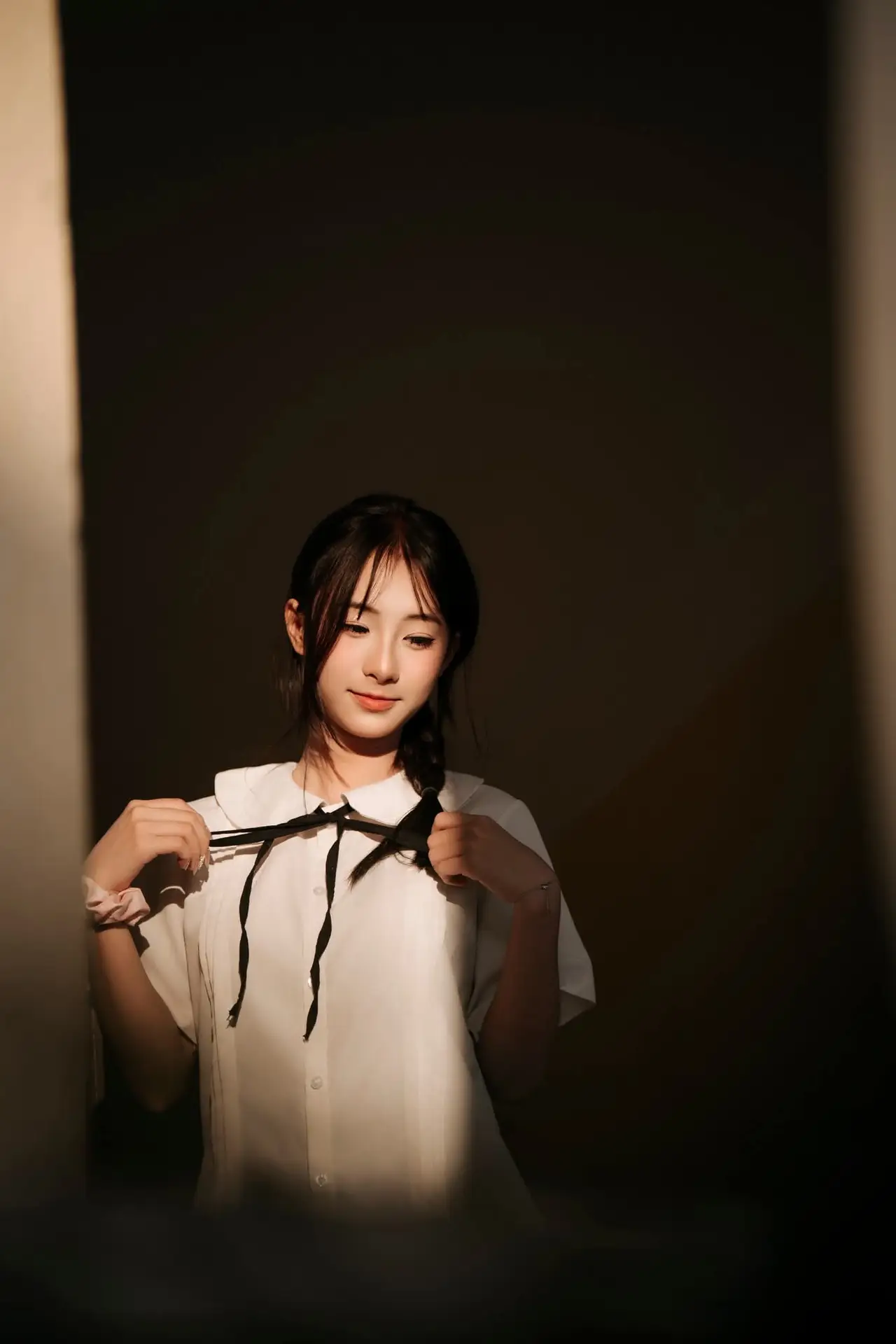 Gentle Beauty of a Young Woman in Golden Light: An Evocative Portrait.