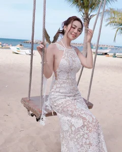 Viral TikToker Stuns in Sheer Lace Dress: A Masterclass in Beachfront Fashion - image 5