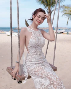 Viral TikToker Stuns in Sheer Lace Dress: A Masterclass in Beachfront Fashion - image 1
