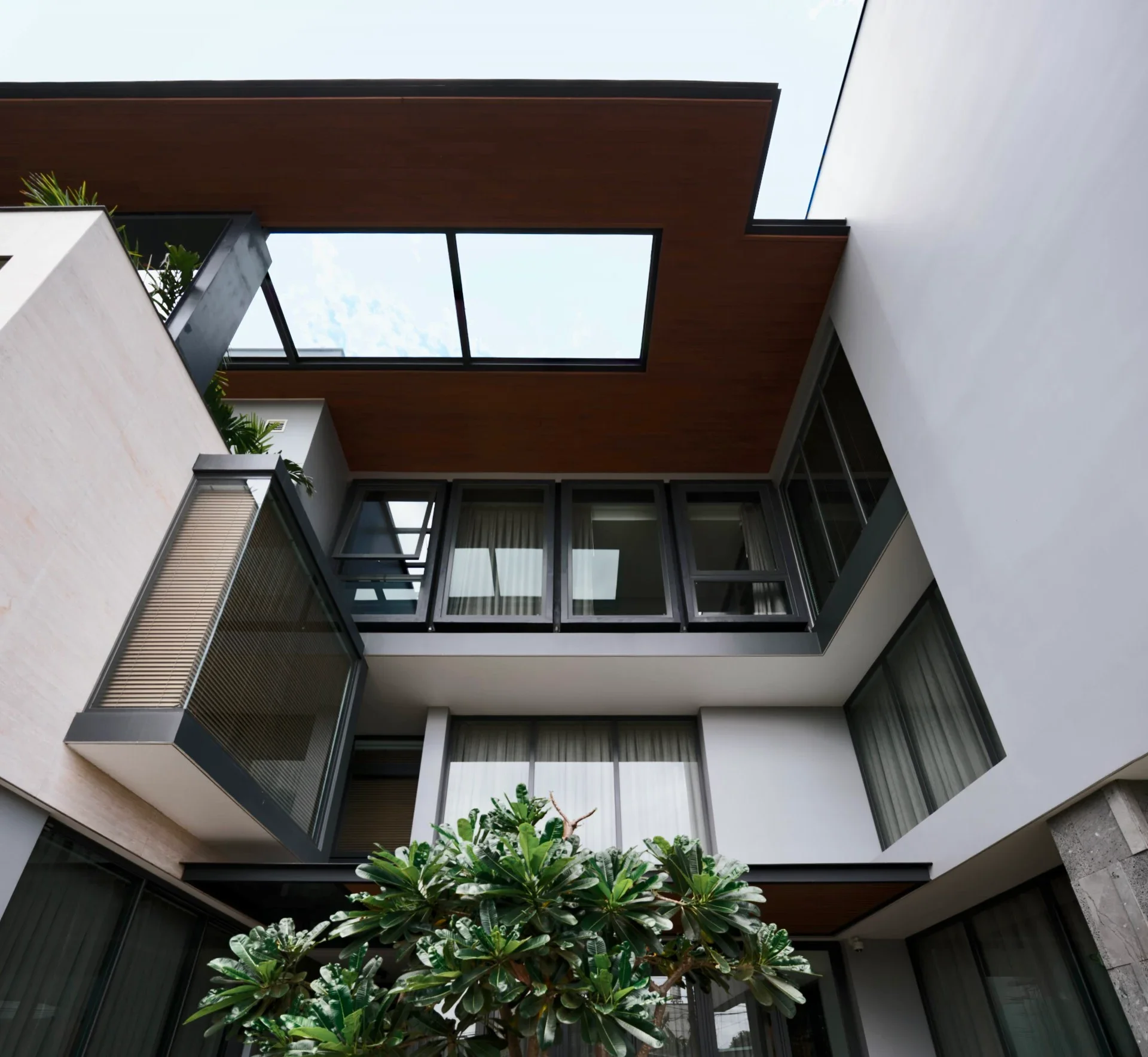 Modern Tropical Villa in Tay Ninh: Layered Design for Natural Cooling and Light