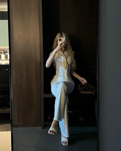 Gen Z Influencer Goes Viral with Bold Tape Dress Fashion Statement - image 4