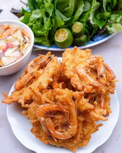 Exploring the Culinary Paradise of Dong Xuan Market: 7 Must-Try Street Food Delicacies in Hanoi - image 11