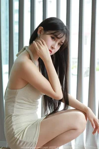 Chic Fashion Gallery: Xiaobao Features a Stunning Halter Neck Bodycon Dress in Latest IESS Collection - image 17