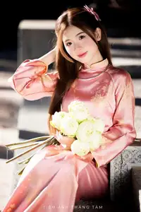 Captivating Serenity: Vietnamese Girl in Pink Ao Dai with Lotus Flowers1730591 - image 3