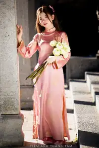 Captivating Serenity: Vietnamese Girl in Pink Ao Dai with Lotus Flowers1730591 - image 25