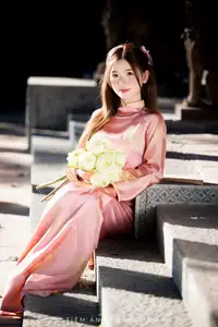 Captivating Serenity: Vietnamese Girl in Pink Ao Dai with Lotus Flowers1730591 - image 8