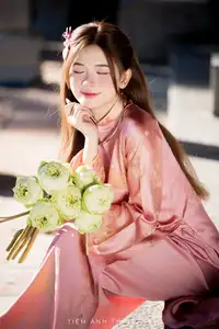 Captivating Serenity: Vietnamese Girl in Pink Ao Dai with Lotus Flowers1730591 - image 28
