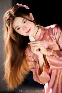 Captivating Serenity: Vietnamese Girl in Pink Ao Dai with Lotus Flowers1730591 - image 17