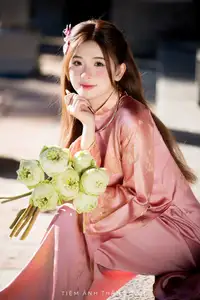 Captivating Serenity: Vietnamese Girl in Pink Ao Dai with Lotus Flowers1730591 - image 7