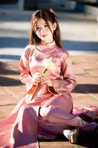 Captivating Serenity: Vietnamese Girl in Pink Ao Dai with Lotus Flowers1730591 - image 19