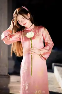 Captivating Serenity: Vietnamese Girl in Pink Ao Dai with Lotus Flowers1730591 - image 16