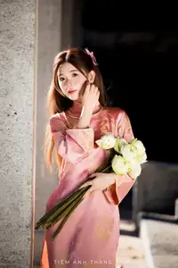 Captivating Serenity: Vietnamese Girl in Pink Ao Dai with Lotus Flowers1730591 - image 12