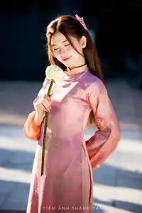 Captivating Serenity: Vietnamese Girl in Pink Ao Dai with Lotus Flowers1730591 - image 13