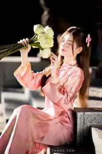 Captivating Serenity: Vietnamese Girl in Pink Ao Dai with Lotus Flowers1730591 - image 22