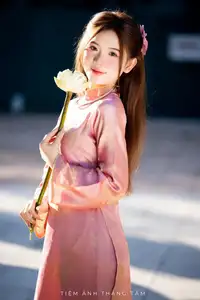 Captivating Serenity: Vietnamese Girl in Pink Ao Dai with Lotus Flowers1730591 - image 29
