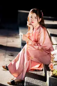 Captivating Serenity: Vietnamese Girl in Pink Ao Dai with Lotus Flowers1730591 - image 21