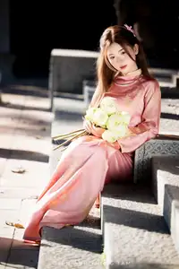 Captivating Serenity: Vietnamese Girl in Pink Ao Dai with Lotus Flowers1730591 - image 2