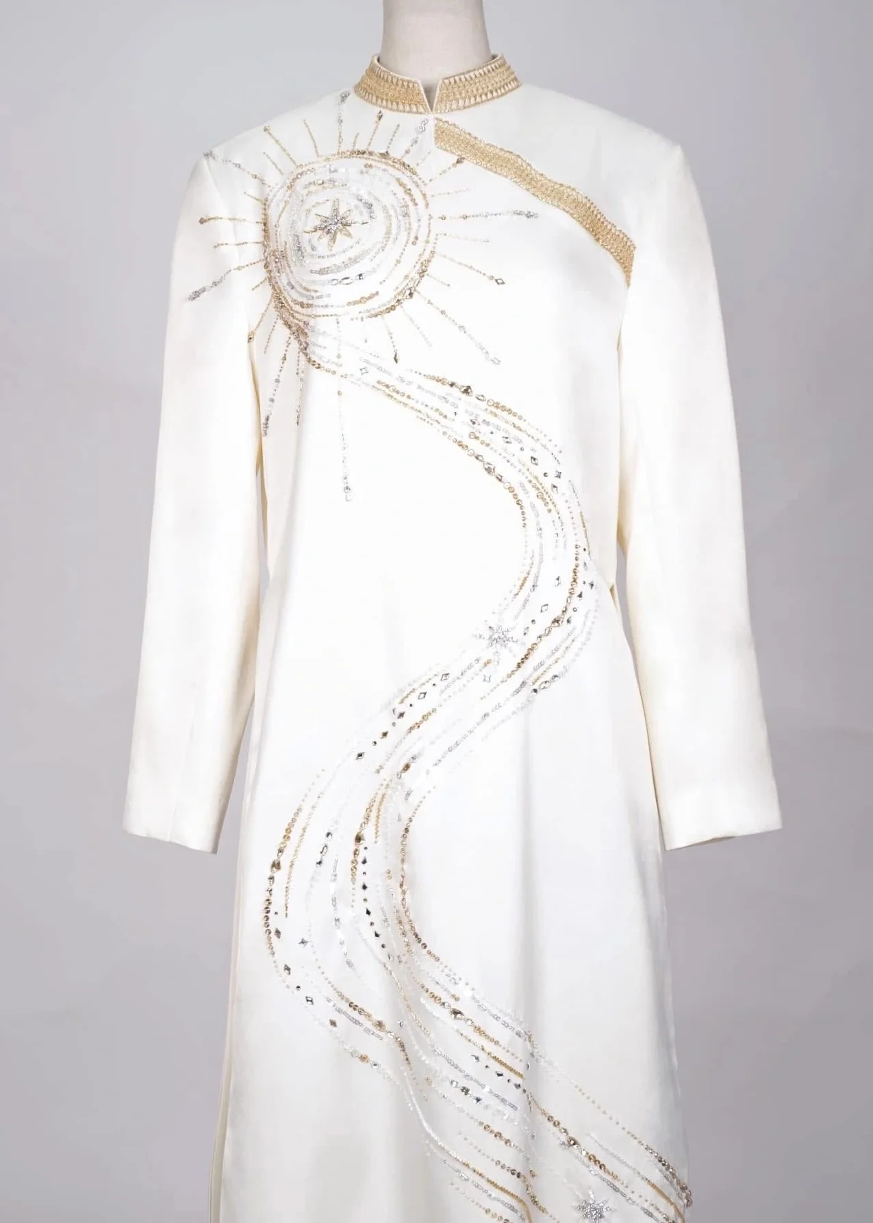 Sparkling Elegance: Runner-up Phuong Nhi Shines in Swarovski-Encrusted Ao Dai for Her Engagement Ceremony
