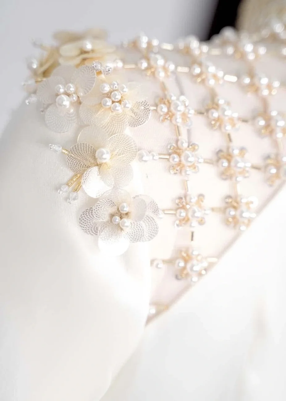 Sparkling Elegance: Runner-up Phuong Nhi Shines in Swarovski-Encrusted Ao Dai for Her Engagement Ceremony