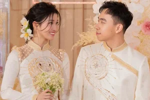 Sparkling Elegance: Runner-up Phuong Nhi Shines in Swarovski-Encrusted Ao Dai for Her Engagement Ceremony - image 5