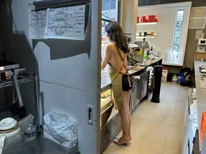 Controversial Cafe Sparks Intense Debate Over Revealing Outfits of Female Staff - image 2