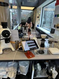 Controversial Cafe Sparks Intense Debate Over Revealing Outfits of Female Staff - image 0