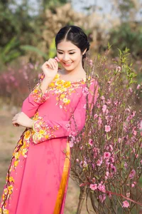 Stunning Spring Portraits: Celebrating Beauty Amid Peach and Apricot Blossoms - image 2