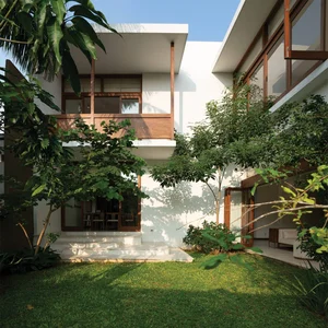 Modern Two-Story Light-Filled House Design for Tech Professional Couples - image 18