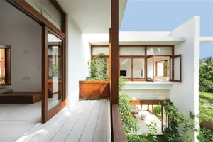 Modern Two-Story Light-Filled House Design for Tech Professional Couples - image 6