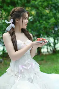 Ethereal Beauty: Young Woman in White Amidst Lush Green Nature - image 7
