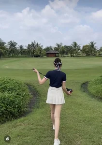 Miss Vietnam Do Ha Turns Heads in Chic Golf Outfit Showing Off Stunning Legs - image 0
